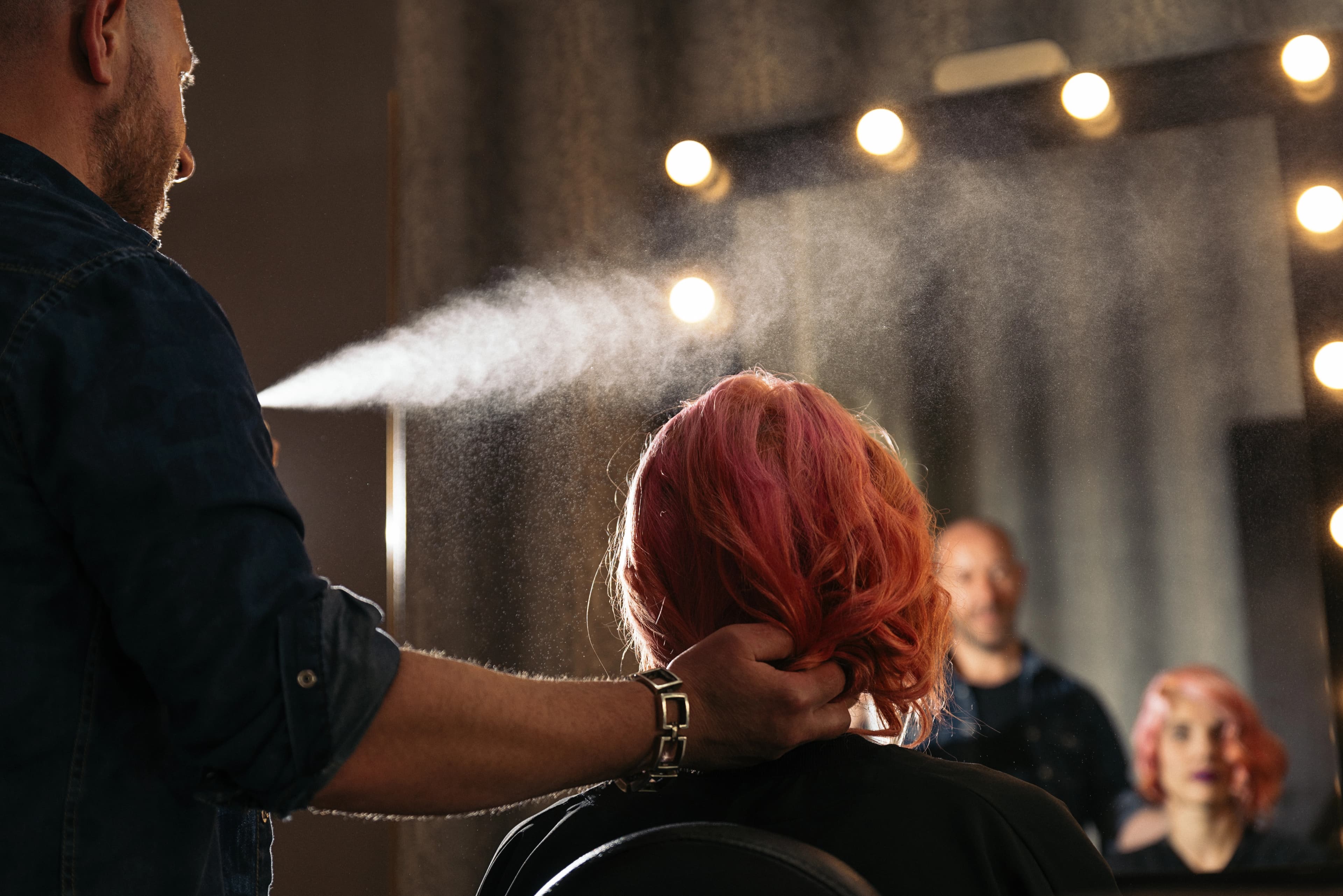 Hairdresser cutting hair