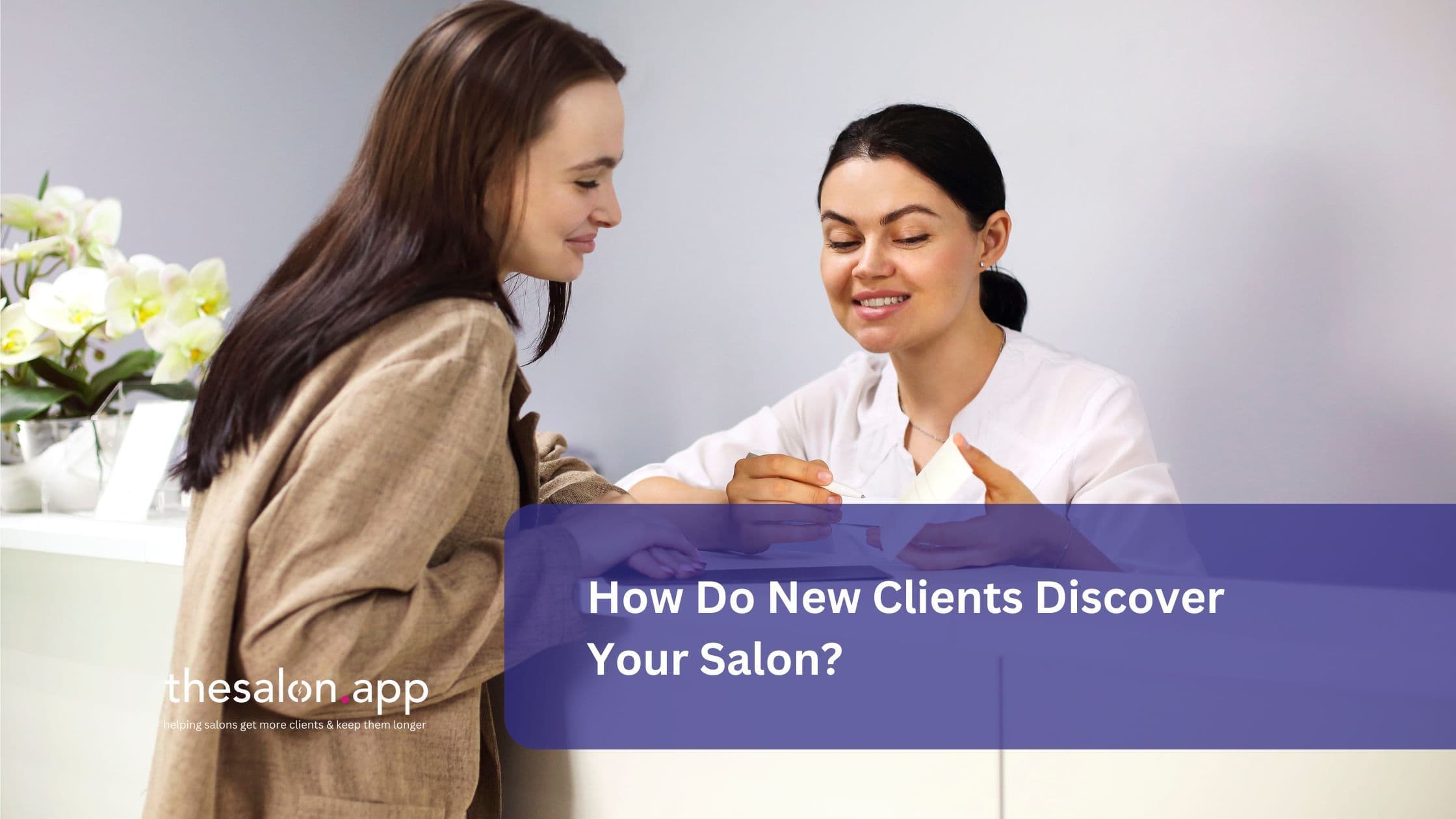 A friendly salon receptionist warmly welcomes a new client, discussing services and options at the front desk.