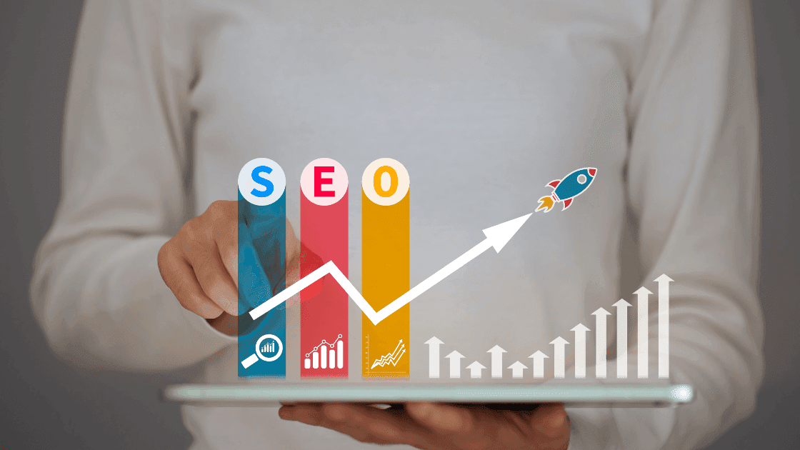 A person holding a tablet with an SEO growth chart overlay, illustrating how salon SEO strategies can boost online visibility and attract more clients.