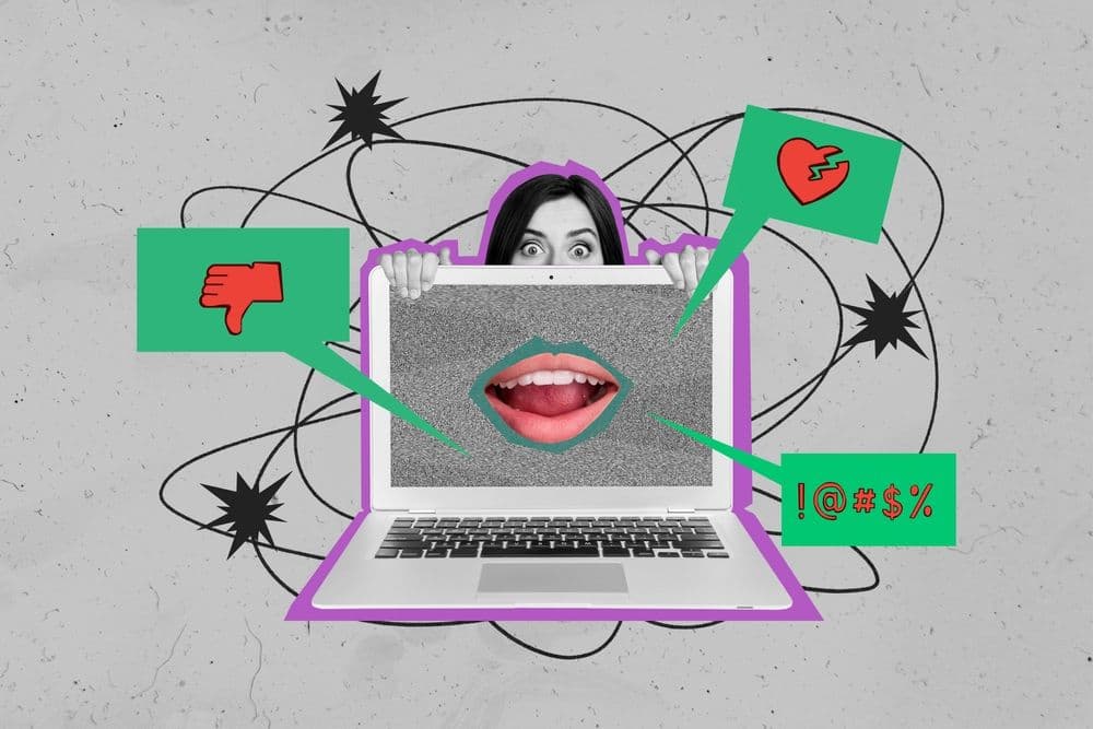 Abstract collage showing a woman peeking over a laptop with speech bubbles containing negative icons like a thumbs down, broken heart, and angry symbols, representing online criticism.